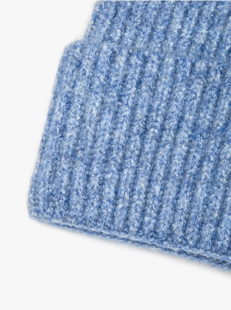 Blue hat with wool accents