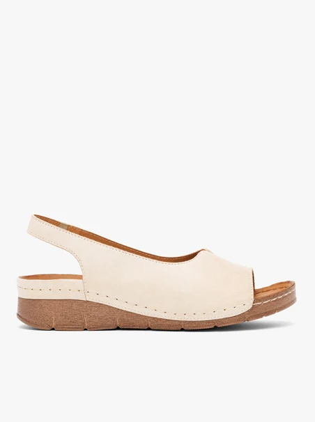 Cream-colored full-grain leather sandals